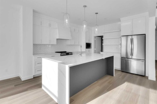 140 Copperhead Road Se, Calgary, AB - Indoor Photo Showing Kitchen With Upgraded Kitchen