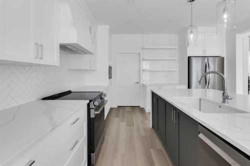 140 Copperhead Road Se, Calgary, AB - Indoor Photo Showing Kitchen