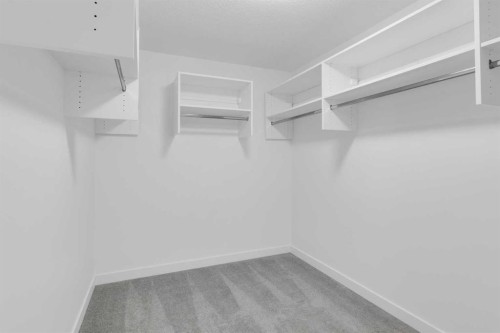 140 Copperhead Road Se, Calgary, AB - Indoor With Storage