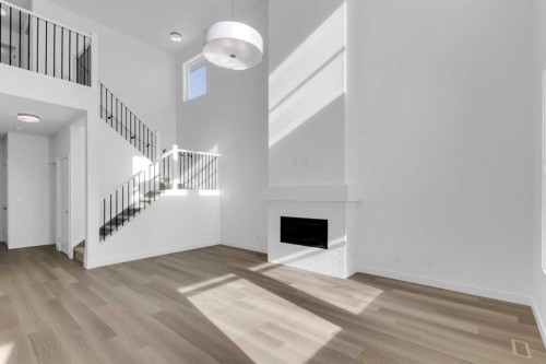 140 Copperhead Road Se, Calgary, AB - Indoor With Fireplace