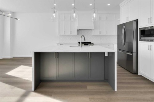 144 Copperhead Road Se, Calgary, AB - Indoor Photo Showing Kitchen With Upgraded Kitchen