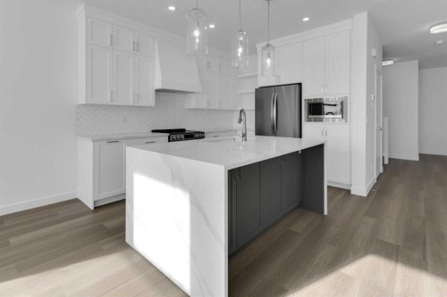 144 Copperhead Road Se, Calgary, AB - Indoor Photo Showing Kitchen With Upgraded Kitchen