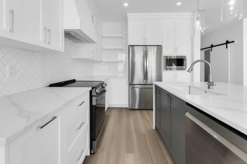 144 Copperhead Road Se, Calgary, AB - Indoor Photo Showing Kitchen With Upgraded Kitchen