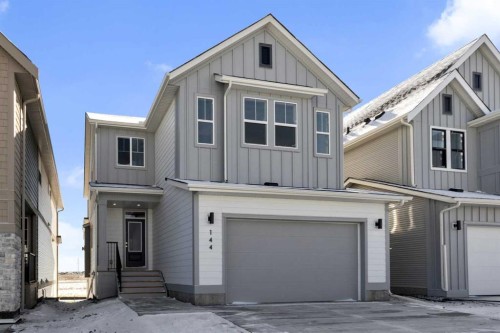 144 Copperhead Road Se, Calgary, AB - Outdoor With Facade