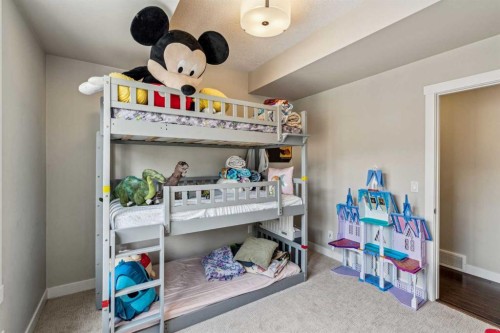 30 Cranbrook Villas Se, Calgary, AB - Indoor Photo Showing Bedroom
