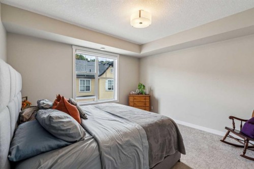 30 Cranbrook Villas Se, Calgary, AB - Indoor Photo Showing Bedroom