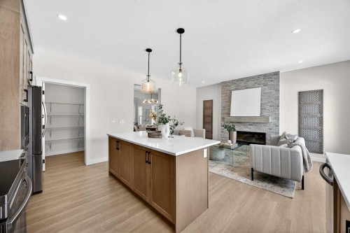 52 Fireside Common Sw, Cochrane, AB - Indoor With Fireplace