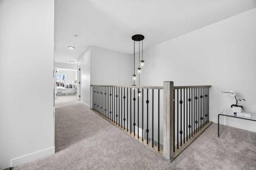 52 Fireside Common Sw, Cochrane, AB - Indoor Photo Showing Other Room