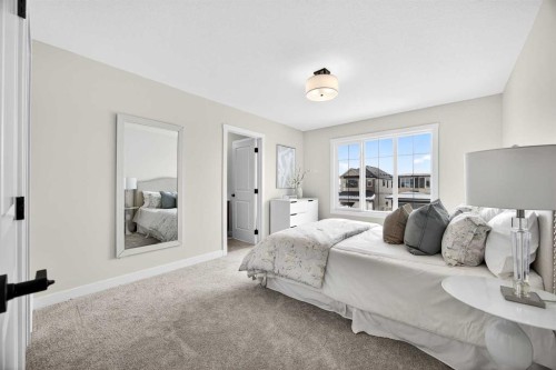 52 Fireside Common Sw, Cochrane, AB - Indoor Photo Showing Bedroom