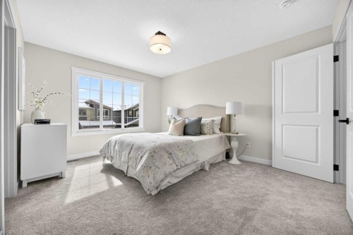 52 Fireside Common Sw, Cochrane, AB - Indoor Photo Showing Bedroom