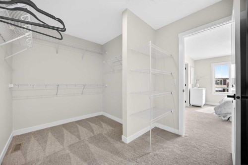 52 Fireside Common Sw, Cochrane, AB - Indoor With Storage