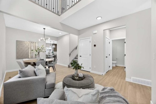 52 Fireside Common Sw, Cochrane, AB - Indoor Photo Showing Living Room