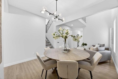 52 Fireside Common Sw, Cochrane, AB - Indoor Photo Showing Dining Room