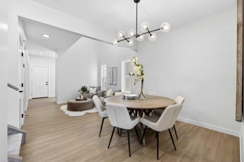 52 Fireside Common Sw, Cochrane, AB - Indoor Photo Showing Dining Room