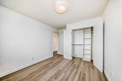 7 Signature Mews Sw, Calgary, AB - Indoor Photo Showing Other Room