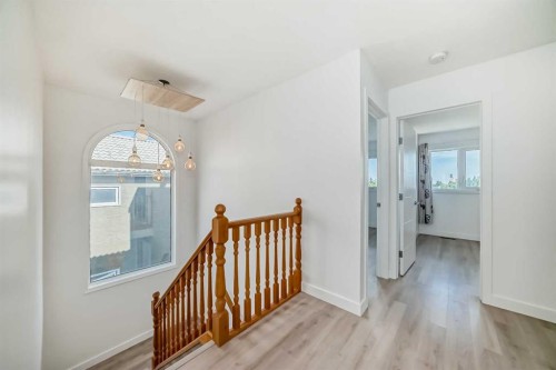 7 Signature Mews Sw, Calgary, AB - Indoor Photo Showing Other Room