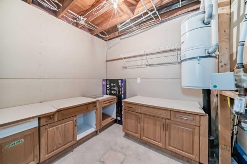 7 Signature Mews Sw, Calgary, AB - Indoor Photo Showing Basement