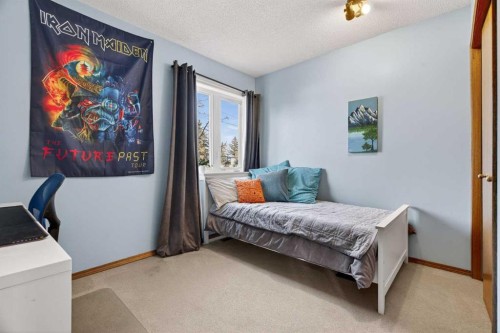 28 Mckerrell Close Se, Calgary, AB - Indoor Photo Showing Bedroom