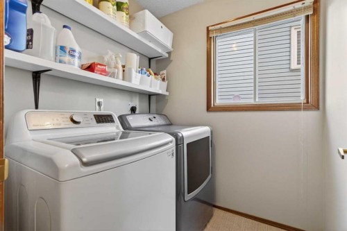 28 Mckerrell Close Se, Calgary, AB - Indoor Photo Showing Laundry Room