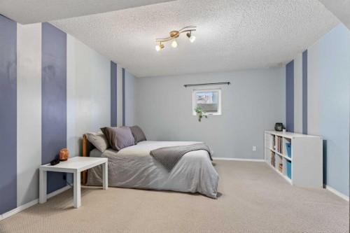 28 Mckerrell Close Se, Calgary, AB - Indoor Photo Showing Bedroom