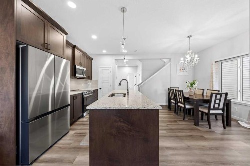 148 Highview Gate Se, Airdrie, AB - Indoor Photo Showing Kitchen With Double Sink With Upgraded Kitchen