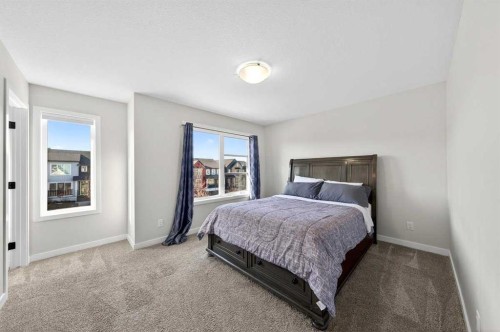148 Highview Gate Se, Airdrie, AB - Indoor Photo Showing Bedroom