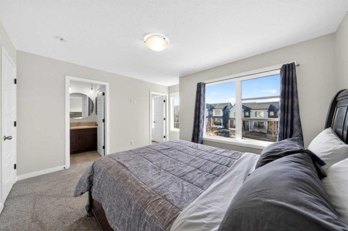 148 Highview Gate Se, Airdrie, AB - Indoor Photo Showing Bedroom