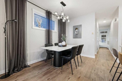 128 Setonstone Gardens Se, Calgary, AB - Indoor Photo Showing Dining Room