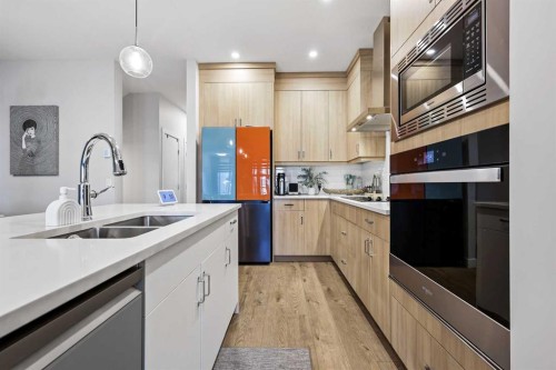 128 Setonstone Gardens Se, Calgary, AB - Indoor Photo Showing Kitchen With Double Sink With Upgraded Kitchen