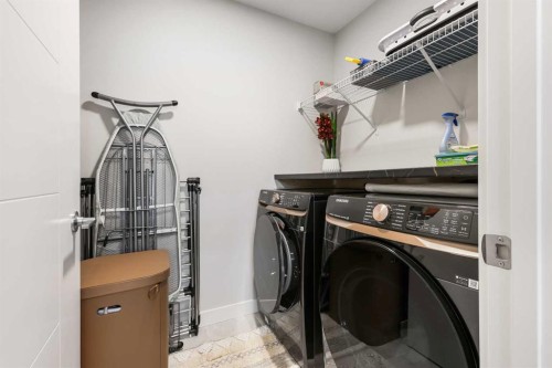 128 Setonstone Gardens Se, Calgary, AB - Indoor Photo Showing Laundry Room