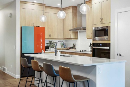 128 Setonstone Gardens Se, Calgary, AB - Indoor Photo Showing Kitchen With Upgraded Kitchen