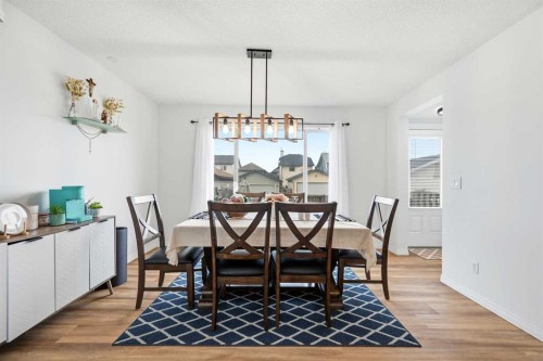 41 New Brighton Green Se, Calgary, AB - Indoor Photo Showing Dining Room