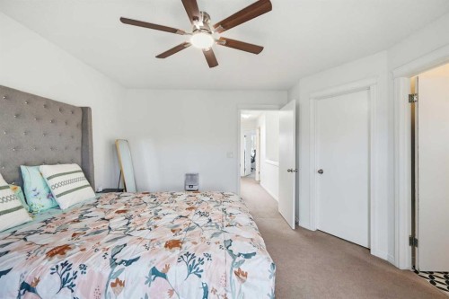41 New Brighton Green Se, Calgary, AB - Indoor Photo Showing Bedroom
