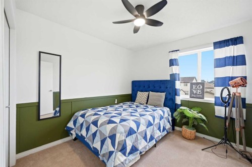 41 New Brighton Green Se, Calgary, AB - Indoor Photo Showing Bedroom