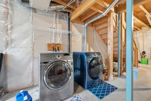 41 New Brighton Green Se, Calgary, AB - Indoor Photo Showing Laundry Room