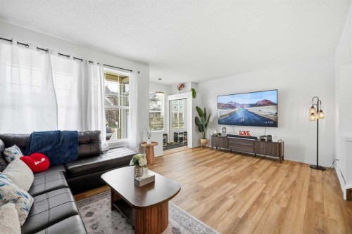 41 New Brighton Green Se, Calgary, AB - Indoor Photo Showing Living Room