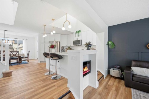 41 New Brighton Green Se, Calgary, AB - Indoor With Fireplace