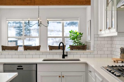 57 Riviera Crescent, Cochrane, AB - Indoor Photo Showing Kitchen With Upgraded Kitchen