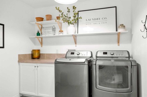 57 Riviera Crescent, Cochrane, AB - Indoor Photo Showing Laundry Room
