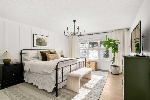 57 Riviera Crescent, Cochrane, AB - Indoor Photo Showing Bedroom