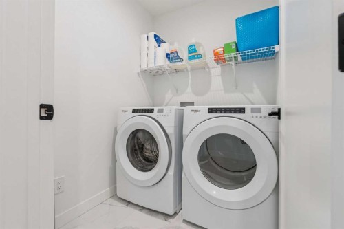 255-7820 Spring Willow Drive Sw, Calgary, AB - Indoor Photo Showing Laundry Room