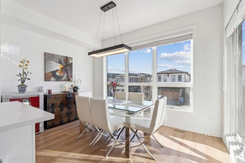 255-7820 Spring Willow Drive Sw, Calgary, AB - Indoor Photo Showing Dining Room