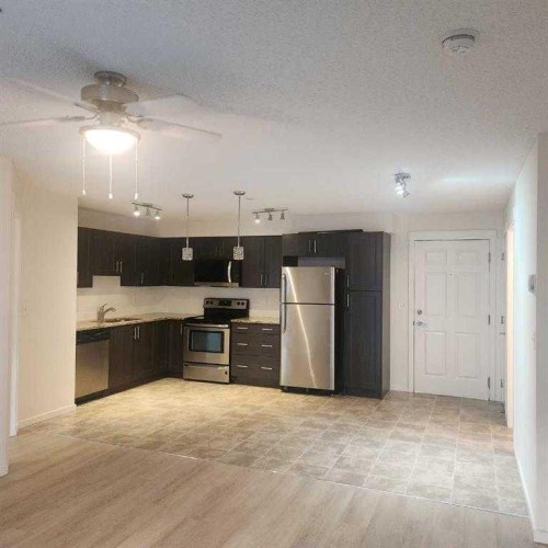 5206-755 Copperpond Boulevard Se, Calgary, AB - Indoor Photo Showing Kitchen With Stainless Steel Kitchen
