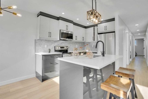 1306 Berkley Drive Nw, Calgary, AB - Indoor Photo Showing Kitchen With Stainless Steel Kitchen With Upgraded Kitchen