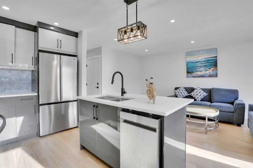 1306 Berkley Drive Nw, Calgary, AB - Indoor Photo Showing Kitchen With Stainless Steel Kitchen With Double Sink With Upgraded Kitchen