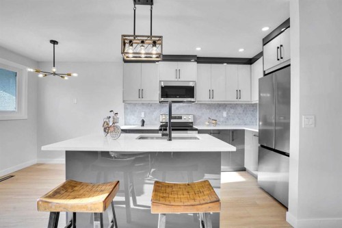 1306 Berkley Drive Nw, Calgary, AB - Indoor Photo Showing Kitchen With Stainless Steel Kitchen With Upgraded Kitchen