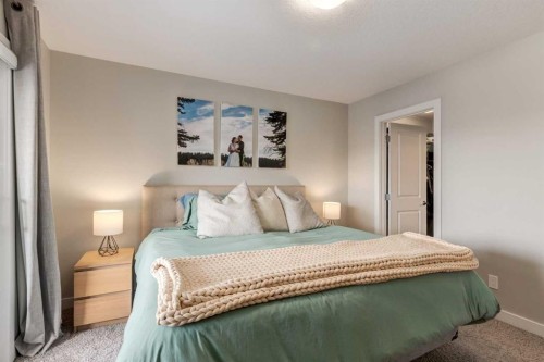 212 Crestbrook Common Sw, Calgary, AB - Indoor Photo Showing Bedroom