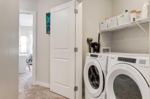212 Crestbrook Common Sw, Calgary, AB - Indoor Photo Showing Laundry Room