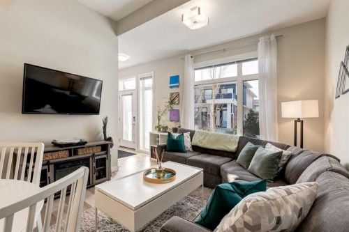 212 Crestbrook Common Sw, Calgary, AB - Indoor Photo Showing Living Room