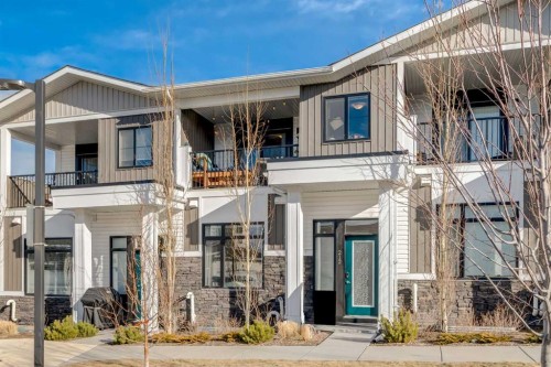 212 Crestbrook Common Sw, Calgary, AB - Outdoor With Balcony With Facade